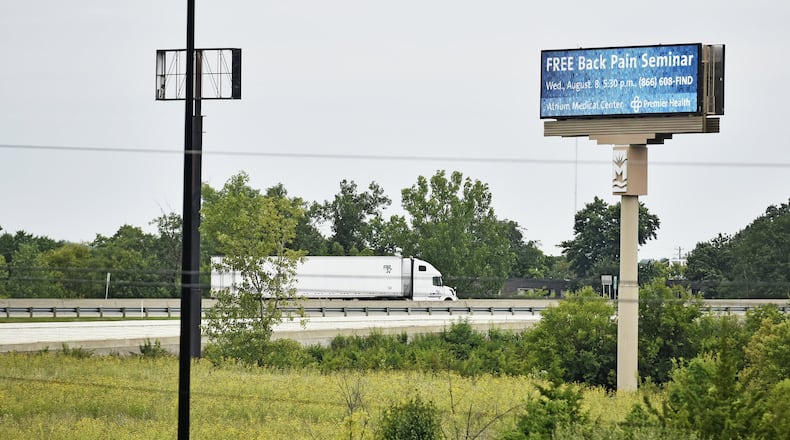 The Ohio Department of Transportation has issued a removal order against the city of Middletown and Premier Health/Atrium Medical Center to remove the electronic sign near the interchange of Interstate 75 and Ohio 122. NICK GRAHAM/STAFF