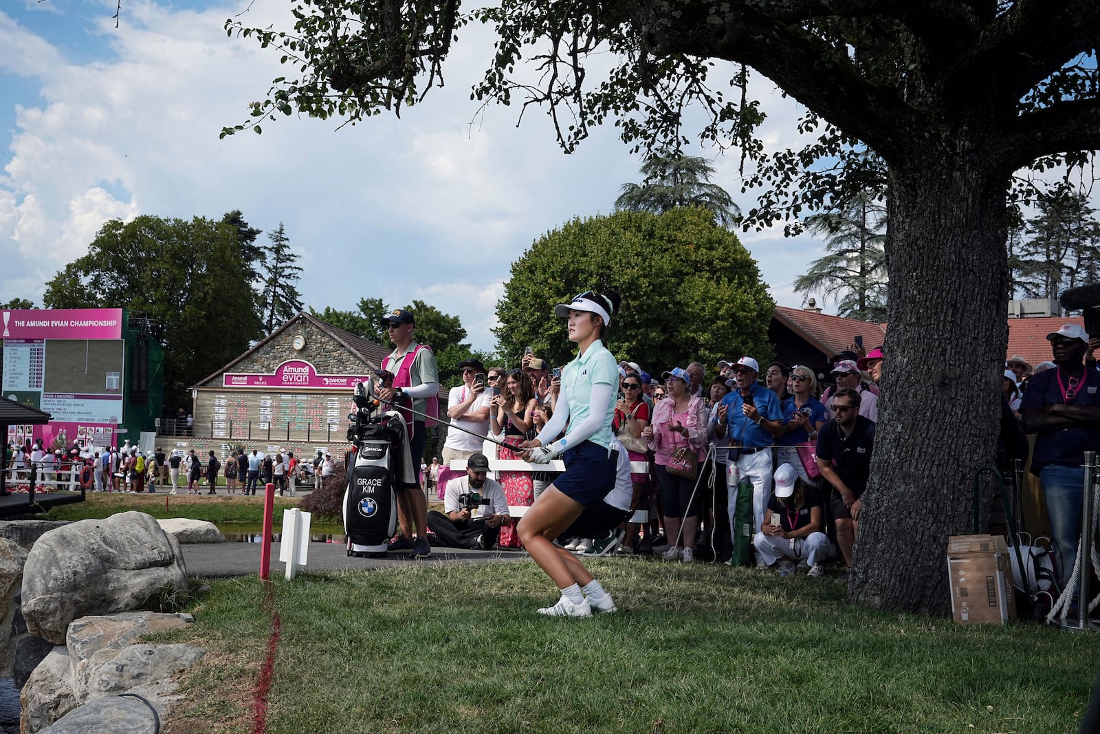 Grace Kim, of Australia, plays on the 18th hole on her way to win the Evian Championship women's golf tournament, in Evian, eastern France, Sunday, July 13, 2025. (AP Photo/Laurent Cipriani)