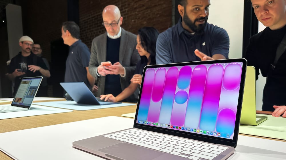 A MacBook Neo sits on display during an Apple unveil event, Wednesday, March 4, 2026, in New York (AP Photo/Ted Shaffrey) ,