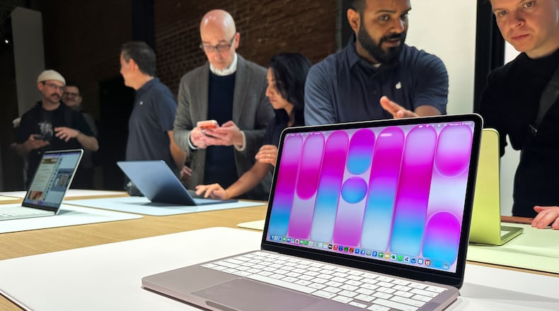 A MacBook Neo sits on display during an Apple unveil event, Wednesday, March 4, 2026, in New York (AP Photo/Ted Shaffrey) ,