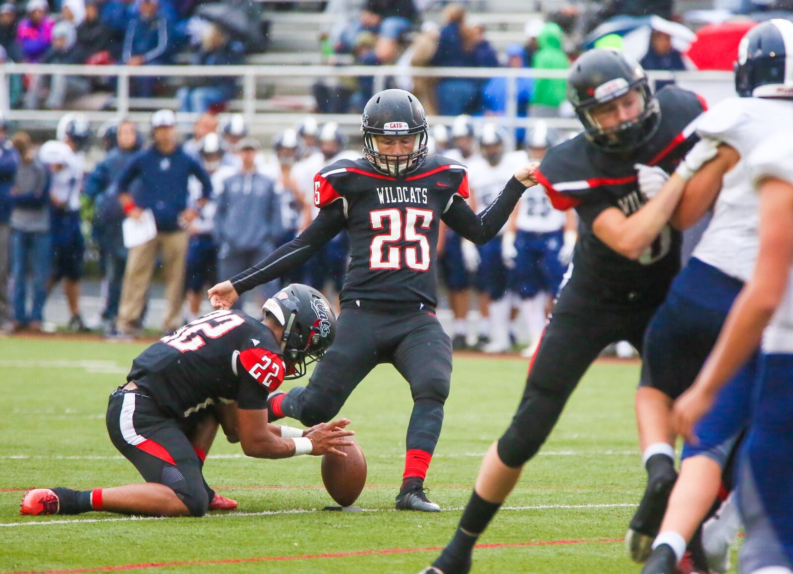 Franklin place-kicker Matt Schneider (25) makes an extra point during a Sept. 1 game against Edgewood at Atrium Stadium in Franklin. GREG LYNCH/STAFF