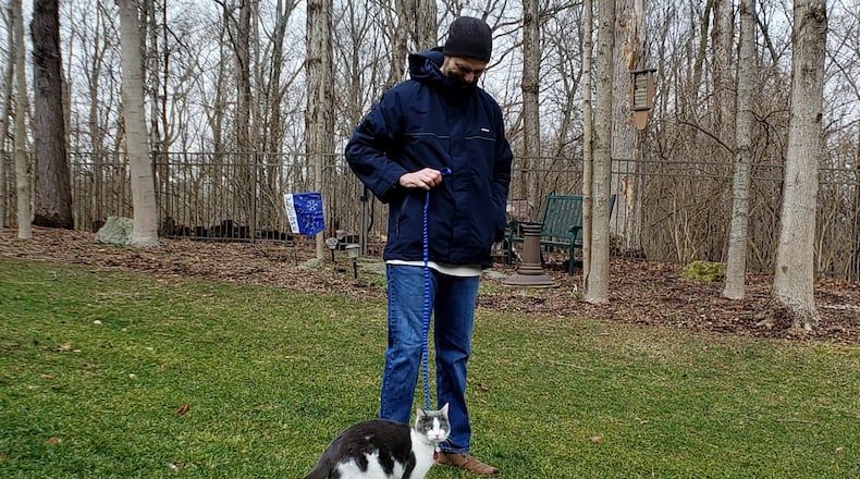 Pip and Ed wandering in their backyard. KARIN SPICER