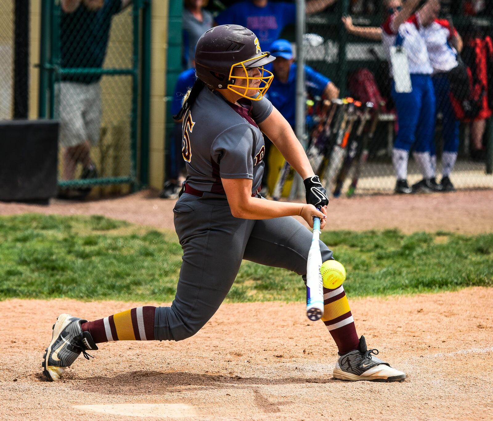 Whitley Arno of Ross makes solid contact with the ball during a Division II district final against Clinton-Massie on Friday at Mason. NICK GRAHAM/STAFF