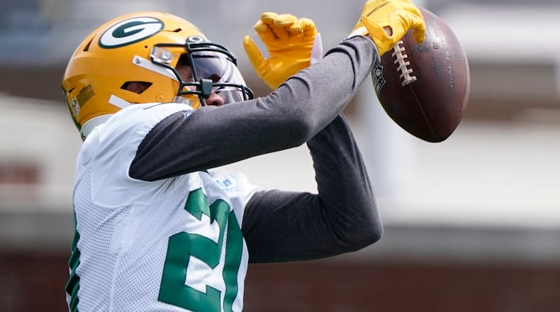 Green Bay Packers' Danny Davis runs a drill at the NFL football team's practice field training camp Tuesday, May 24, 2022, in Green Bay, Wis. (AP Photo/Morry Gash)