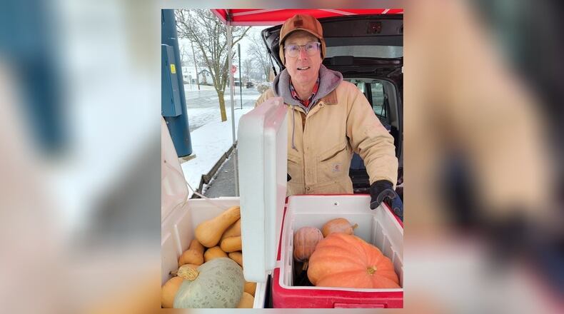 Craig Harkrider shows a variety of winter squash grown at his Stoney Hedgerow Farm. He sells it at the Oxford Farmers Market and at MOON Co-Op. CONTRIBUTED