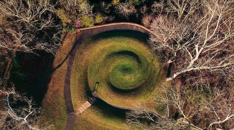 Serpent Mound's coiled tail has alignment with the summer solstice sunset. Serpent Mound is the largest surviving ancient effigy mound in the world and is on the National Register of Historic Places. It is located near Peebles, Ohio on State Route 73. TY GREENLEES / STAFF
