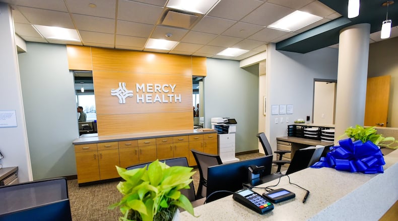 Ribbon cutting ceremony and tour was held for Mercy Health-Kyles Station Medical Center at 4652 Partners Place in Liberty Twp. Wednesday, Oct. 16. The new facility will have primary care and cardiac care physicians and room for expansion as needed. Mercy Health’s new $7.5 million, 11,500 square foot primary and specialty care practice and urgent care office opens on Monday, October 21. NICK GRAHAM/STAFF