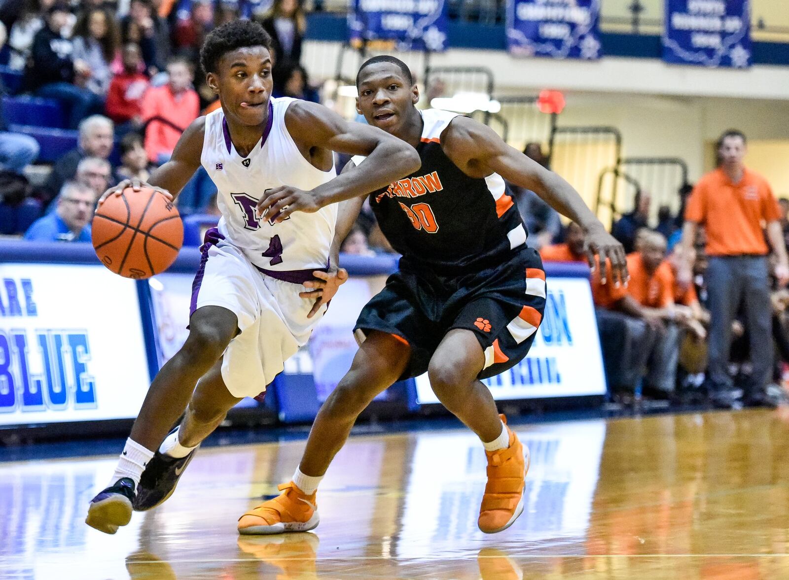 Middletown’s Aaron Jones makes a move past Withrow’s Niles Whatley during Wednesday night’s Division I sectional semifinal at the Hamilton Athletic Center. NICK GRAHAM/STAFF