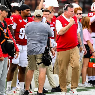 Miami football coach Chuck Martin gestures to his players during their game against UNLV last week at Yager Stadium. KYLE HENDRIX / CONTRIBUTED