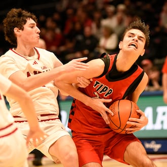 Trotwood-Madison beat Goshen, Badin beat Tecumseh, Tippecanoe beat LaSalle and Hughes beat Bellbrook in Division III district final games on Sunday, March 7, 2026 at UD Arena. PHOTOS BY MICHAEL COOPER, GEOFF NEVILLE AND BELLBROOK LOCAL SCHOOLS