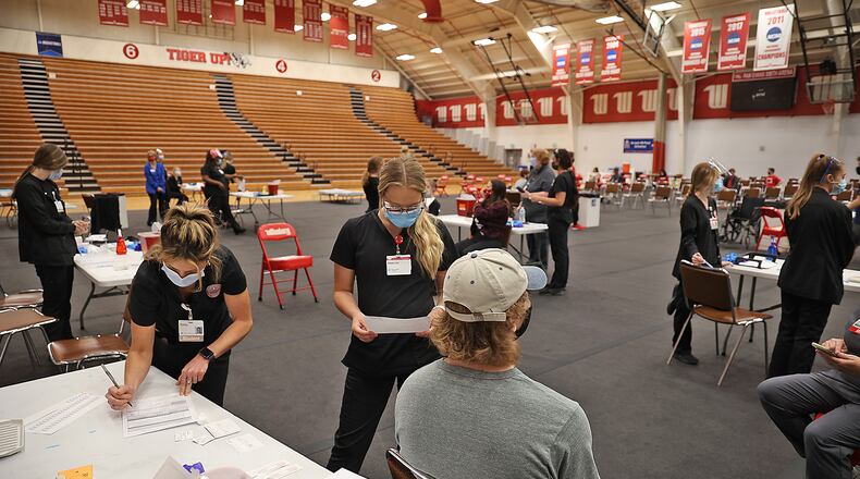 A COVID vaccination clinic was set up in the Pam Evans Smith Arena at Wittenberg University to vaccinate students. BILL LACKEY/STAFF