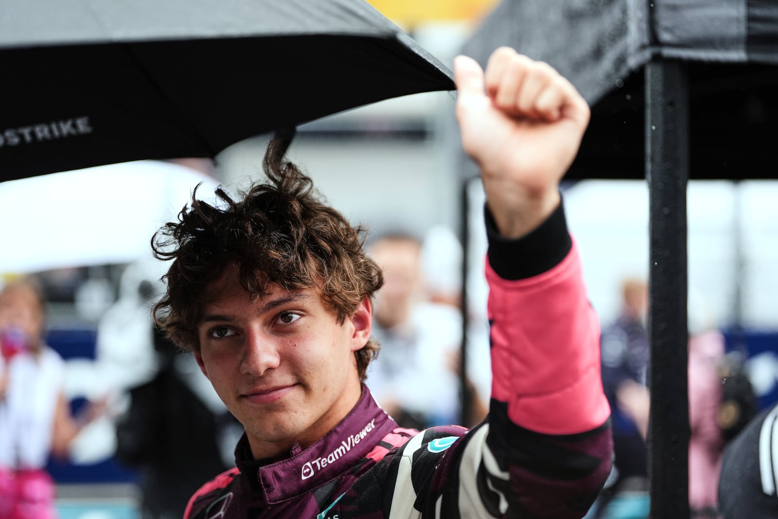 Mercedes driver Kimi Antonelli of Italy greets fans before the Sprint race at the Formula One Miami Grand Prix auto race, Saturday, May 3, 2025, in Miami Gardens, Fla. (AP Photo/Rebecca Blackwell)