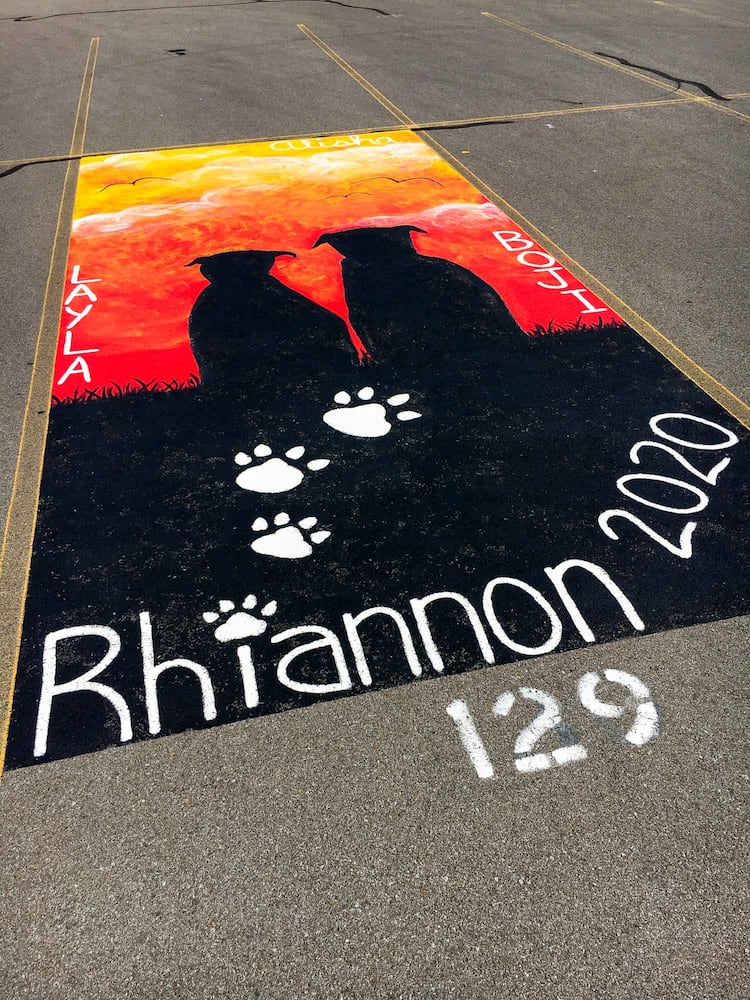 PHOTOS Lakota East seniors paint parking spots