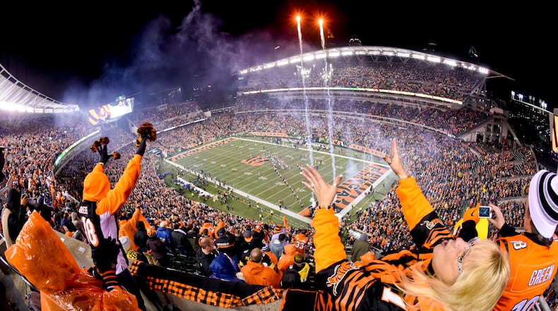 Fans cheer on the Cincinnati Bengals before their 18-16 loss to the Pittsburgh Steelers in the AFC wild card playoff game Saturday, Jan. 9 at Paul Brown Stadium in Cincinnati. NICK GRAHAM/STAFF