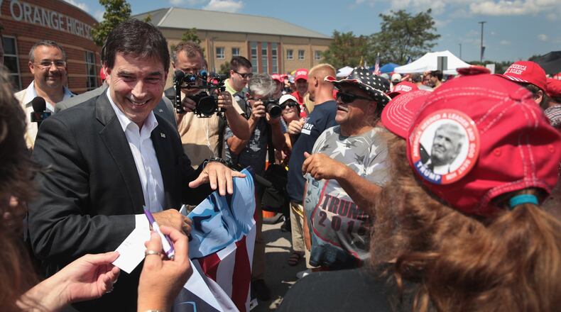 Republican congressional candidate Troy Balderson greets guests before the start of a rally with President Donald Trump August 4, 2018 in Lewis Center, Ohio. Balderson faces Democratic challenger Danny O’Connor for Ohio’s 12th Congressional District on Tuesday. Trump was at the rally to show support for Balderson. (Photo by Scott Olson/Getty Images)