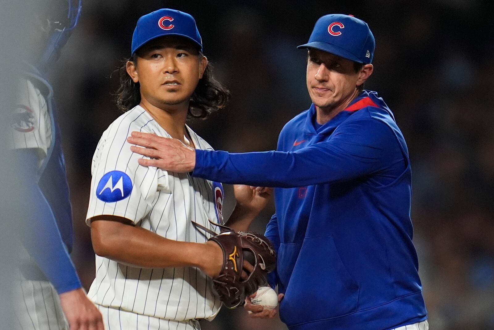 Chicago Cubs starting pitcher Shota Imanaga (18) is pulled from the mound by manager Craig Counsell (11) during the sixth inning of a baseball game against the Cleveland Guardians, Wednesday, July 2, 2025, in Chicago. (AP Photo/Erin Hooley)