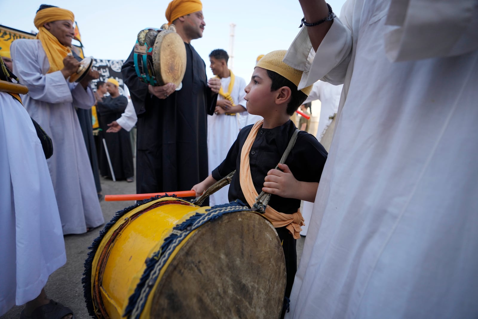 FILE - Sufi Muslims perform Zikr, or remembrance of God, as they sing Islamic songs during a parade to commemorate the beginning of the Islamic new year, 1446 Hijri, in Cairo, Egypt, July 7, 2024. (AP Photo/Amr Nabil, File)