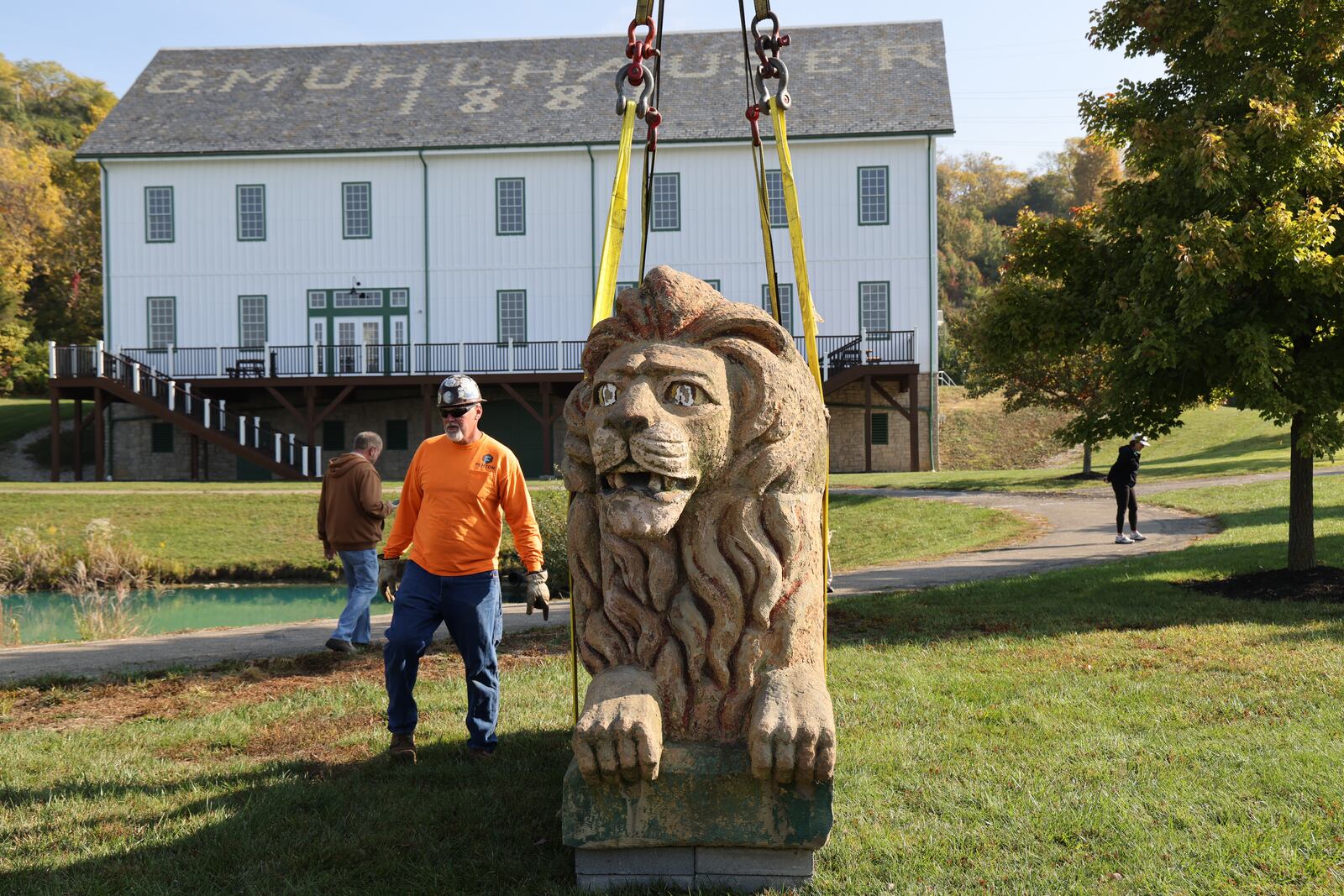 A 10,000-pound lion statue with a legacy from Cincinnati’s storied brewery history has a new home at a local park. The 10-foot long and six-foot high stone lion once adorned the top of a long-closed brewery building but had spent his recent decades on a farm with a family connection to the brewery in Ross Twp. Dubbed “Leo” the lion is now standing guard in West Chester Twp.’s Beckett Park, a lion’s leap or two from the township’s historic Muhlhauser Barn off Beckett Road. CONTRIBUTED/ WEST CHESTER TWP.