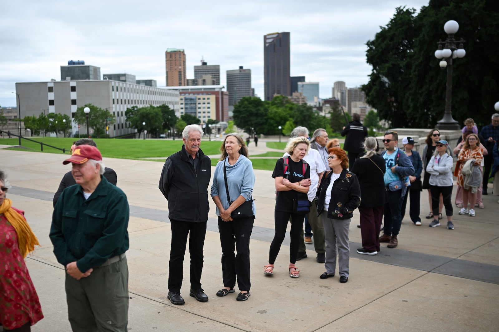People line up to pay their respect to former Minnesota House Speaker Melissa Hortman, who will lie in state with her husband, Mark, and their golden retriever, Gilbert at the Minnesota Capitol rotunda on Friday, June 17, 2025 in St. Paul, Minn. (Aaron Lavinsky/Star Tribune via AP)