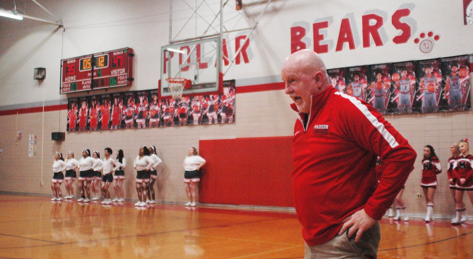 Madison coach Jeff Smith reacts to a play during Saturday night’s game against Northridge in Harrison Township. Madison won 62-51. RICK CASSANO/STAFF