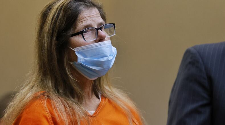 Nancy C. Imfeld, 64, was indicted for felonious assault in the shooting of her husband, Douglas, at their home in Monroe in December. Imfeld appeared for a hearing in Butler County Common Pleas Court Thursday, Jan. 13, 2022 in Hamilton. NICK GRAHAM / STAFF