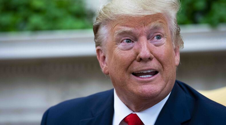 President Donald Trump speaks in the Oval Office of the White House, in Washington on Wednesday. (Doug Mills/The New York Times)