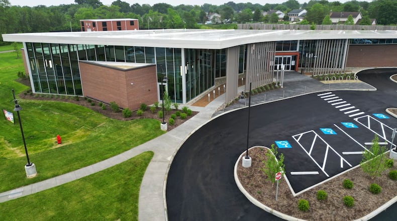 MidPointe Library System operates branches in Middletown, Monroe, Trenton, West Chester Twp. and Liberty Twp. NICK GRAHAM/STAFF