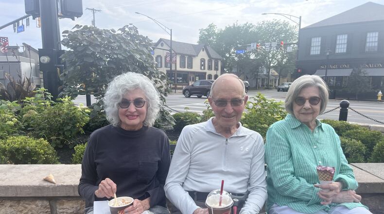 From left, Sue Ann Schirmer and Raymond Schirmer of Kettering, and Betty Baker of Centerville. Sue Ann Schirmer said of Biden's Sunday announcement: “I think, if he didn’t drop out, it would make it easier for Trump to win” (PHOTO: Lillian Ali)