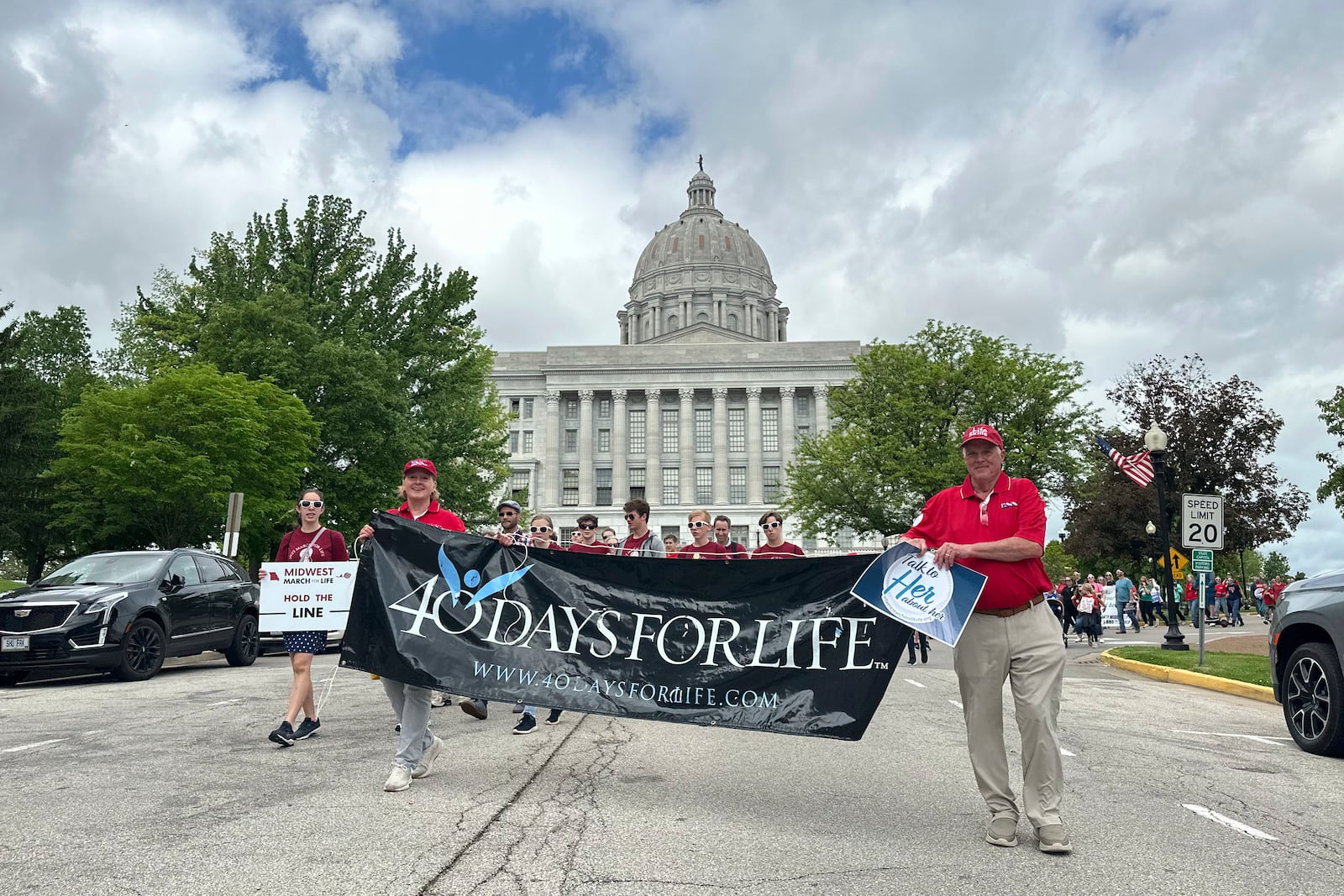 FILE - Participants in the Midwest March for Life walk through the streets of Jefferson City, Mo., in front of the state Capitol on May 1, 2025. (AP Photo/David A. Lieb, File)