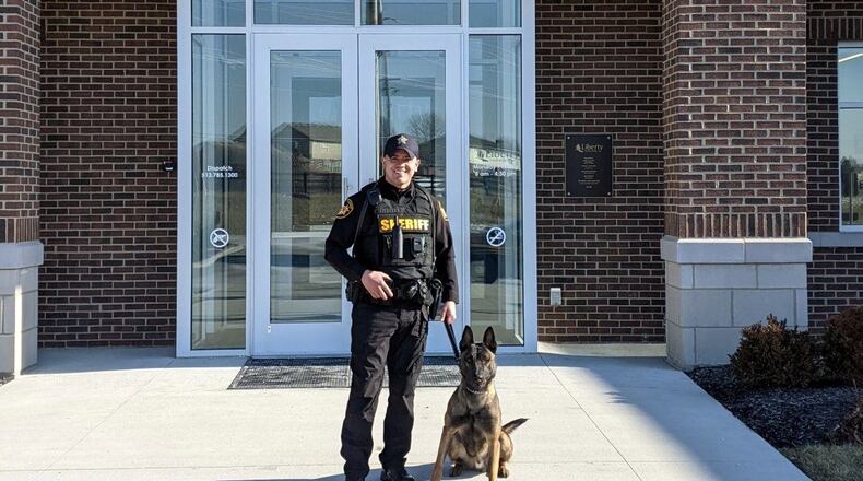 Butler County Deputy Anthony Wilmer with new K-9 Boris. CONTRIBUTED