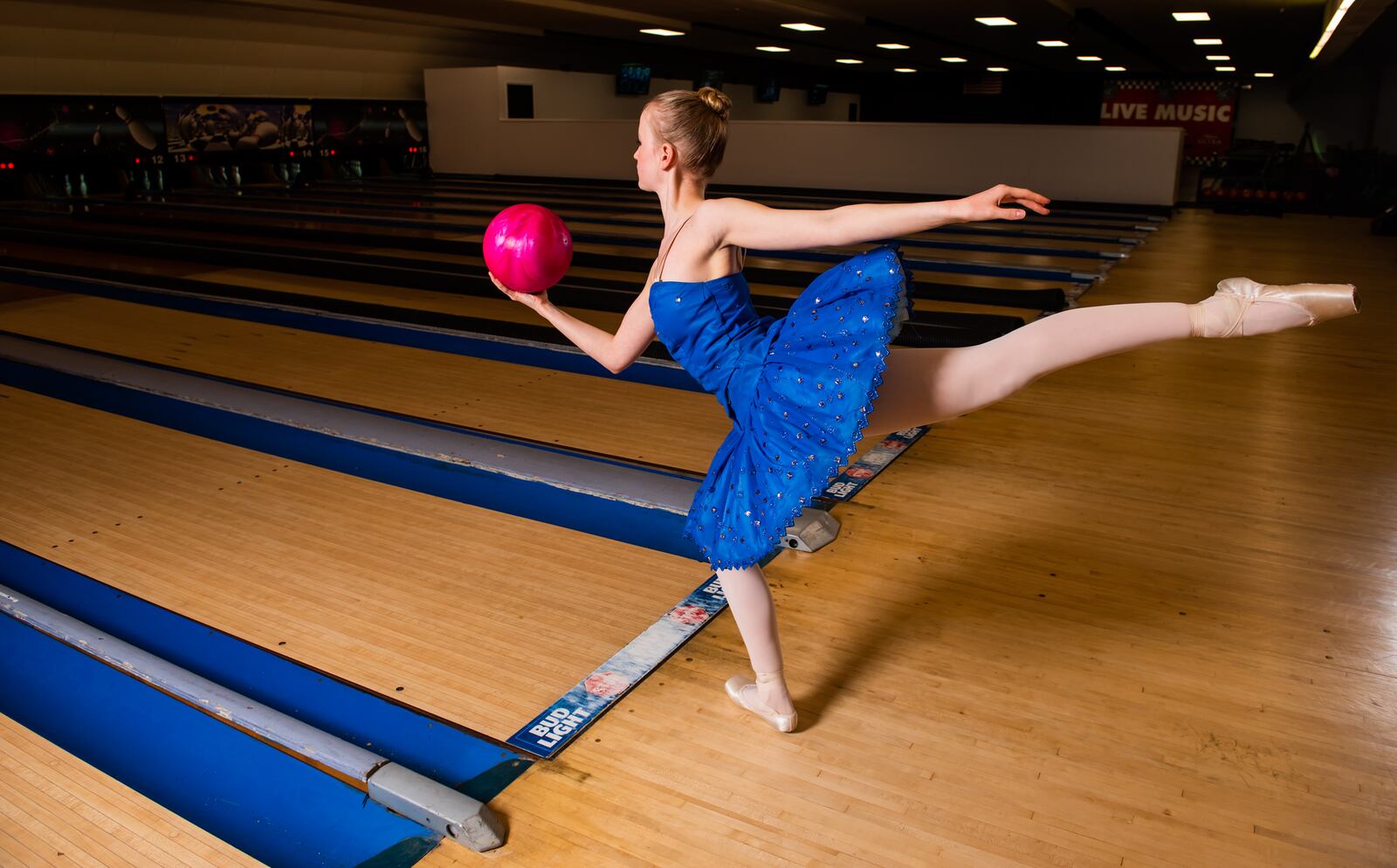 Clare Sherman, 15, with Miami Valley Ballet Theatre, poses for a photo at Pohlman Lanes and Family Entertainment Complex on Pyramid Hill Blvd. in Hamilton.
  Hamilton’s very own Miami Valley Ballet Theatre dancers are trading out their ballet slippers for bowling shoes, for a very special performance at Pohlman Lanes. Their brand new show is a Fab Four inspired production featuring the music of the Beatles that features an exciting mix of contemporary and modern dance. The Ballet, Beatles and Bowling show is part of Fitton Center's "Outside The Box" series showcasing live arts at around Hamilton. The performance is Sunday, April 11 from 3-5 p.m. NICK GRAHAM / STAFF 