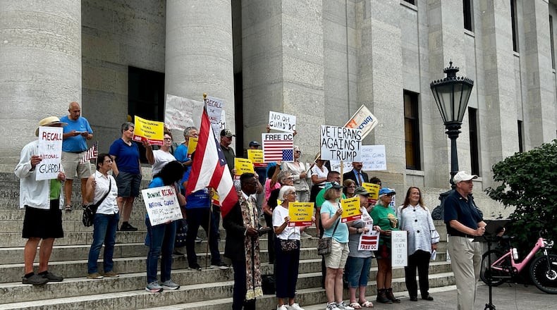 Activists gathered outside the Ohio Statehouse on Wednesday in opposition of Gov. Mike DeWine's decision to send 150 Ohio National Guard troops to Washington, D.C. to take part in an anti-crime mission championed by President Donald Trump. Wednesday, Aug. 20, 2025.