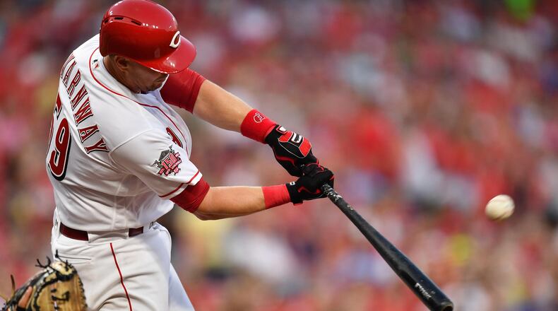 CINCINNATI, OH - JULY 19: Ryan Lavarnway #59 of the Cincinnati Reds hits a three-run home run in the fourth inning against the St. Louis Cardinals at Great American Ball Park on July 19, 2019 in Cincinnati, Ohio. (Photo by Jamie Sabau/Getty Images)