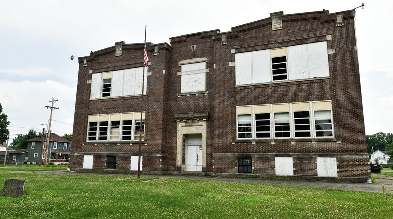 NEW CAPTION FOR 071019 HAM TAYLOR: Taylor School on Corwin Avenue in Hamilton. The Butler County land bank has agreed to contribute almost $40,000, or half the estimated cost to bring down the old Taylor School in Lindenwald. NICK GRAHAM/STAFF >>>>>>>>>>>>>>>>> Taylor School on Corwin Avenue in Hamilton. The Butler County land bank has agreed to contribute almost $40,000, or half the estimated cost to bring down the old Taylor School in Lindenwald. Officials say the site could be the future home of a new fire station but in the near term will be likely be turned into a pocket park. NICK GRAHAM/STAFF