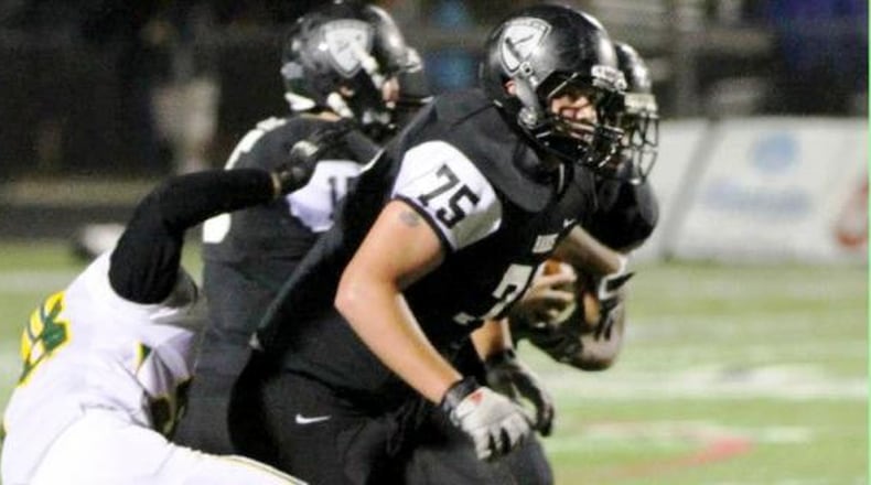 Lakota East High School’s Jarrett LaRubbio (75), seen in action during the 2012 season, is in the starting lineup for Miami University this season. CONTRIBUTED PHOTO