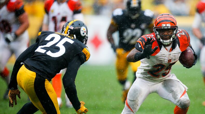 PITTSBURGH, PA - SEPTEMBER 18: Giovani Bernard #25 of the Cincinnati Bengals rushes against Artie Burns #25 of the Pittsburgh Steelers in the fourth quarter during the game at Heinz Field on September 18, 2016 in Pittsburgh, Pennsylvania. (Photo by Justin K. Aller/Getty Images)
