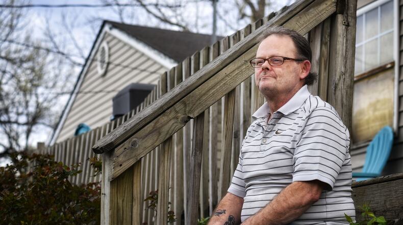David Olivet sits on his porch in Middletown. Olivet who has had 7 heart attacks and 12 stints put in since 2011 said "Don't take life for granted, you could be here one day and gone the next", after his most recent heart attack this year. NICK GRAHAM / STAFF