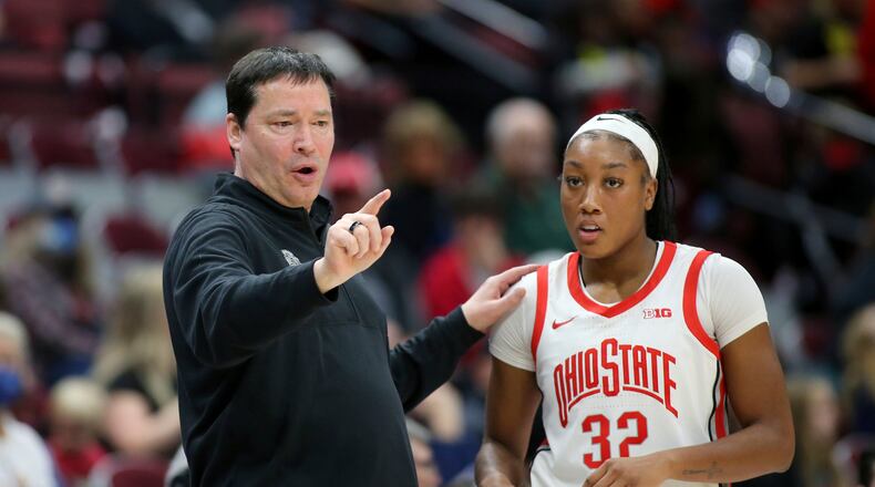 Ohio State head coach Kevin McGuff coaches Ohio State forward Cotie McMahon (32) during the third quarter of an NCAA college basketball game against New Hampshire in Columbus, Ohio, on Thursday, Dec. 8, 2022. (AP Photo/Joe Maiorana)