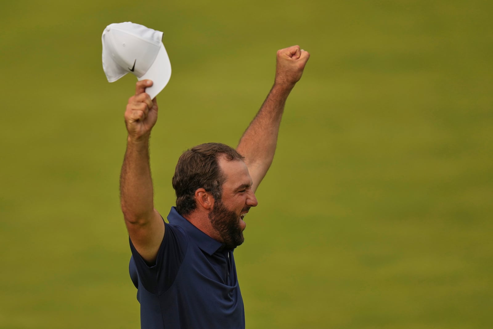 Scottie Scheffler of the United States celebrates after winning the British Open golf championship at the Royal Portrush Golf Club, Northern Ireland, Sunday, July 20, 2025. (AP Photo/Francisco Seco)