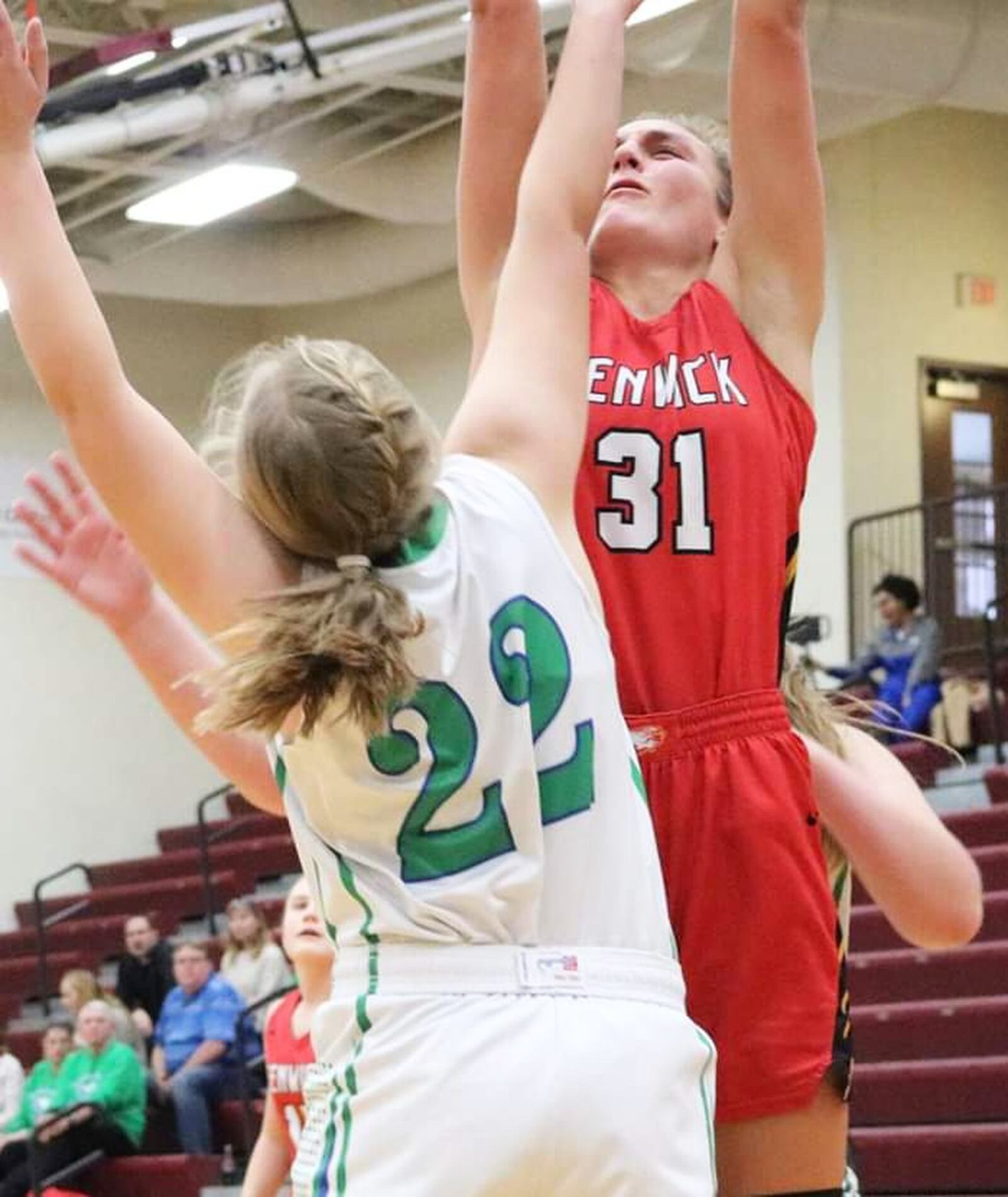 Fenwick’s Emily Adams (31) works down low against Chaminade Julienne’s Campbell Zwierzchowski (22) during Saturday afternoon’s Division II sectional opener at Lebanon. Fenwick won 38-35. CONTRIBUTED PHOTO BY TERRI ADAMS