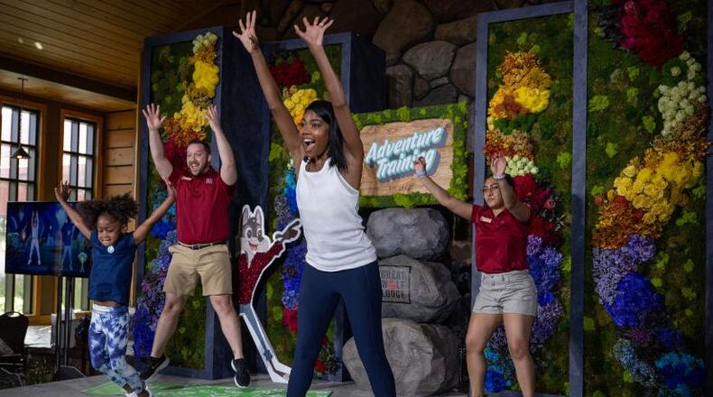 Great Wolf Lodge venues across the nation, including in Mason, Ohio, now have a workout for families called “Adventure Training with the Great Wolf Pack” that is led by actress Gabrielle Union. She is seen in this photo with her daughter, Kaavia. CONTRIBUTED