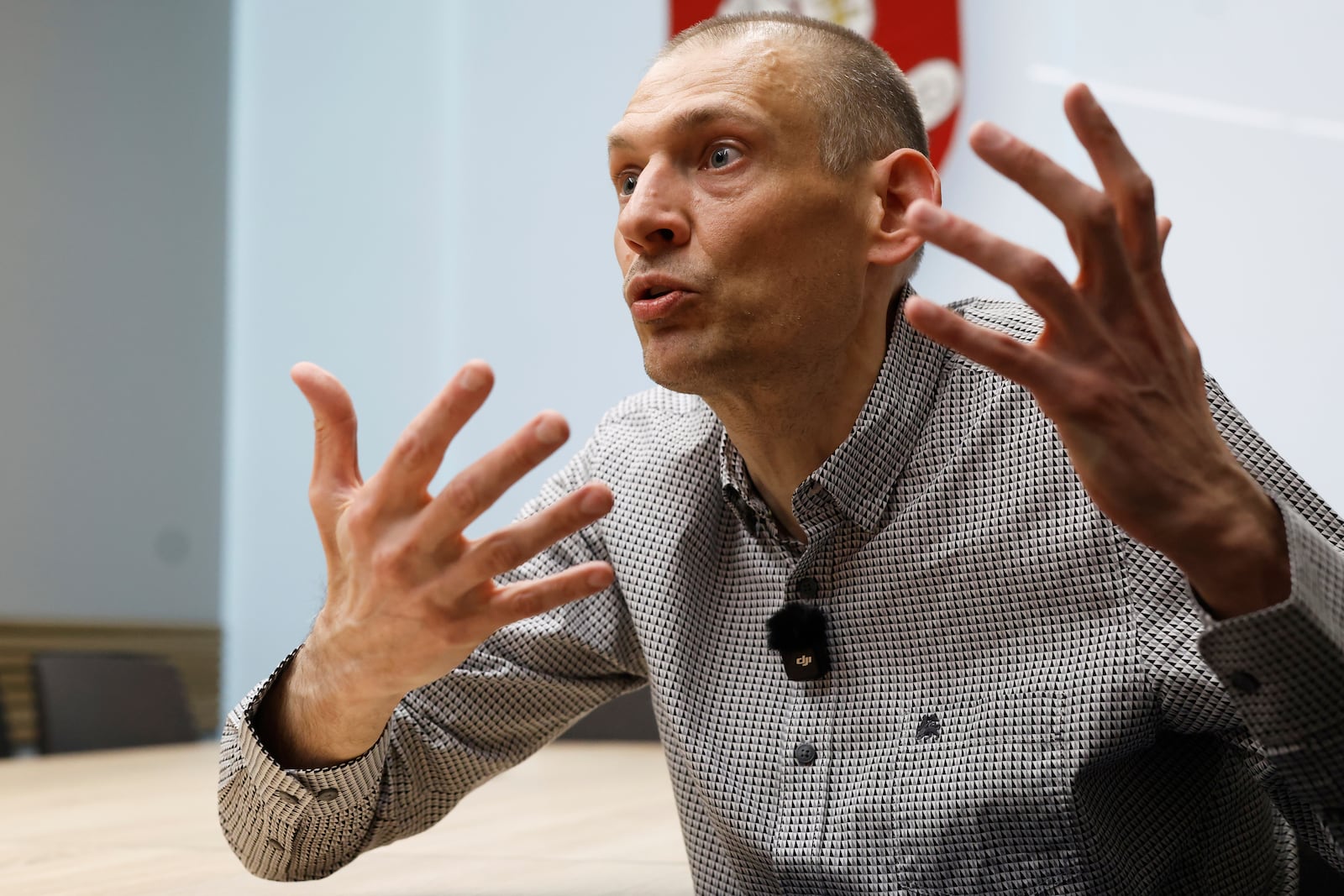 Syarhei Tsikhanouski, a Belarusian opposition activist released from a prison by Belarusian authorities, gestures during an interview with the Associated Press in Vilnius, Lithuania, Sunday, June 22, 2025. (AP Photo/Mindaugas Kulbis)