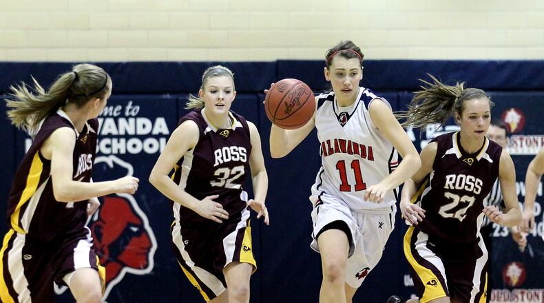 Talawanda’s Ana Richter (11) dribbles the ball on a fast break during a game against visiting Ross on Jan. 14, 2012, in Oxford. JOURNAL-NEWS FILE PHOTO