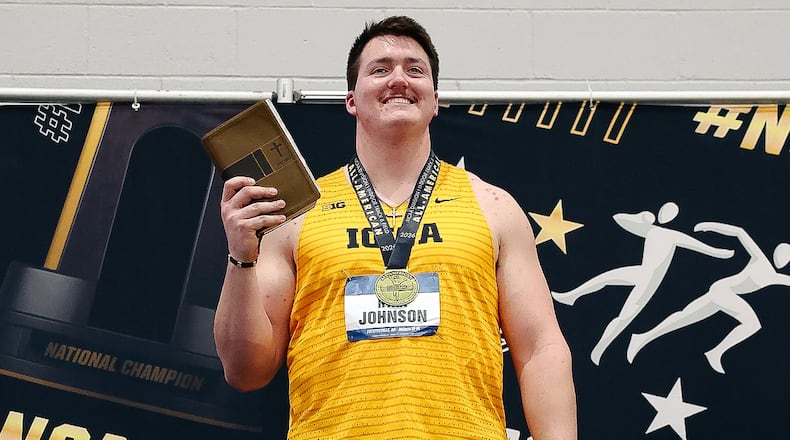 Ryan Johnson, a Springboro High School graduate and junior at Iowa University, wasn't afraid to show his faith after winning the NCAA weight throw championship. PROVIDED PHOTO