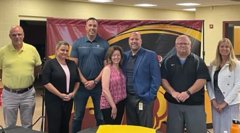 The top financial officer for Ross Schools is leaving their interim position and the school district will fill the opening with a familiar face. Jenni Logan, interim treasurer for Ross, will end her employment with the school system on July 31 and Ross veteran Steve Castator, head of human resources and assistant treasurer, will take over Aug. 1, school officials recently announced. Castator has already been working closely with Logan, who is a former Ohio Treasurer of the Year when she was working in her last, full-time position as financial officer for Lakota Schools. He is pictured in the center with his wife Kim at a recent Ross school board meeting surrounded by board members. CONTRIBUTED