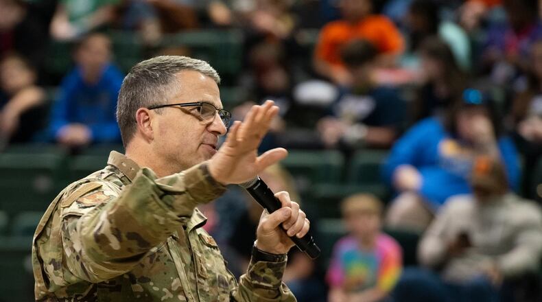 Maj. Gen. William T. Cooley, former Air Force Research Laboratory commander, speaks during the FIRST LEGO League Tournament closing ceremony in the Wright State University Nutter Center, Dayton, Ohio, Feb. 3, 2019. (U.S. Air Force photo by R.J. Oriez)