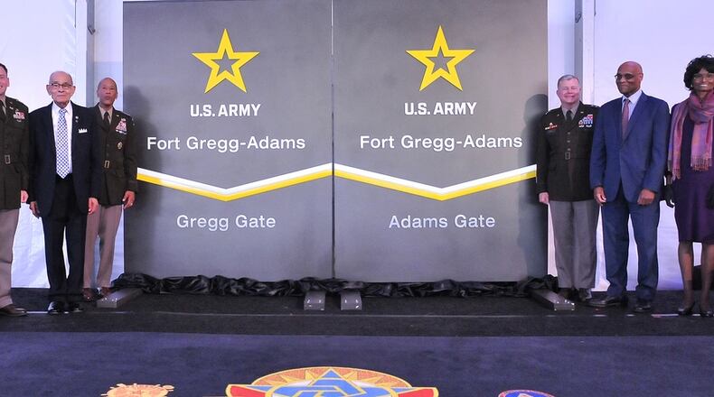 Col. James Hoyman, U.S. Army Garrison commander; retired Lt. Gen. Arthur J. Gregg; Gen. Charles R. Hamilton, commanding general, Army Materiel Command; Maj. Gen. Mark T. Simerly, commanding general, CASCOM and Fort Lee commanding general; and Stanley Earley III and Judith Earley, adult childrenn of Lt. Col. Charity Adams and Stanley Earley Jr., pose for pictures during the Fort Gregg-Adams Redesignation Ceremony April 27 at the Gregg-Adams Club. Army photo