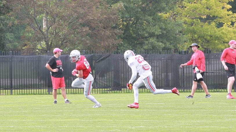 Sam Wiglusz catches a pass against Marcus Hooker in Ohio State Buckeyes practice.