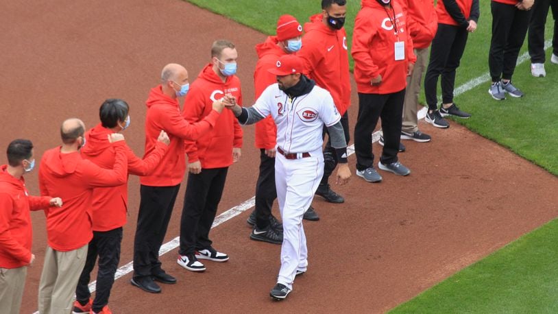 Nick Castellanos, of the Reds, is introduced on Opening Day on Thursday, April 1, 2021, at Great American Ball Park in Cincinnati. David Jablonski/Staff