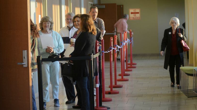 Early voting in Ohio began on Oct. 12 and continues until Nov. 7. Election Day is Nov. 8 and polls are open from 6:30 a.m. until 7:30 p.m. MICHAEL D. PITMAN/STAFF